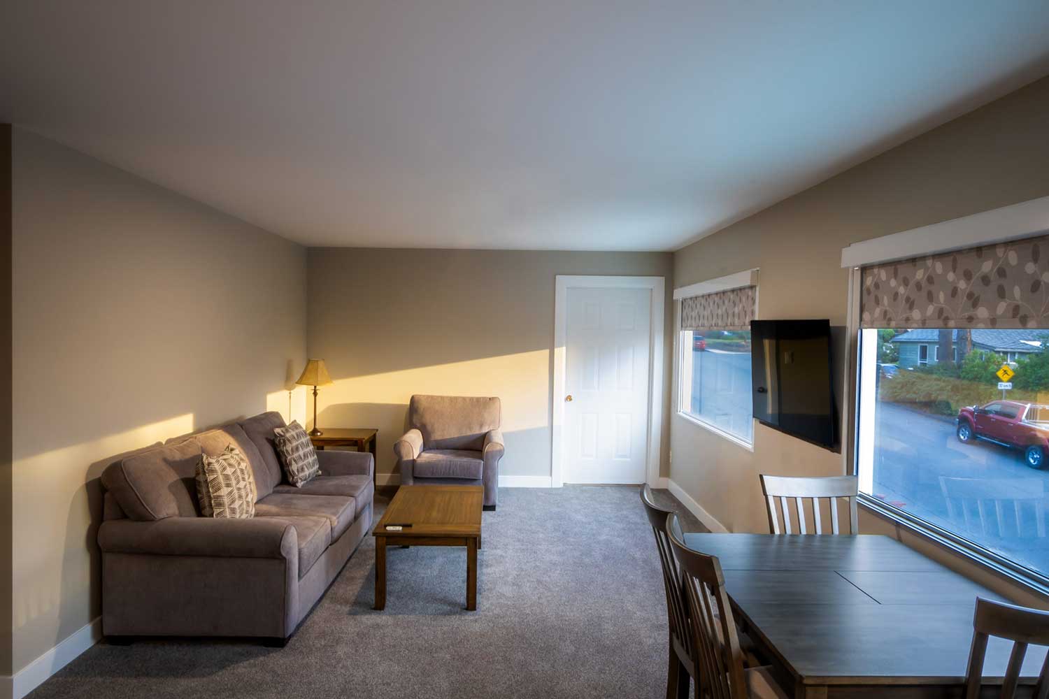 A Junior Suite at Scott's Inn, late afternoon sun streaming through the window.