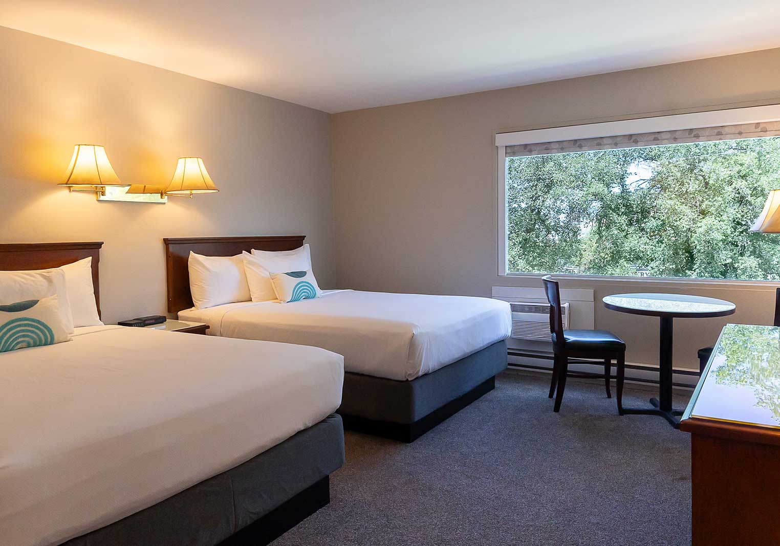 Two beds in a suite at Scott's Inn.