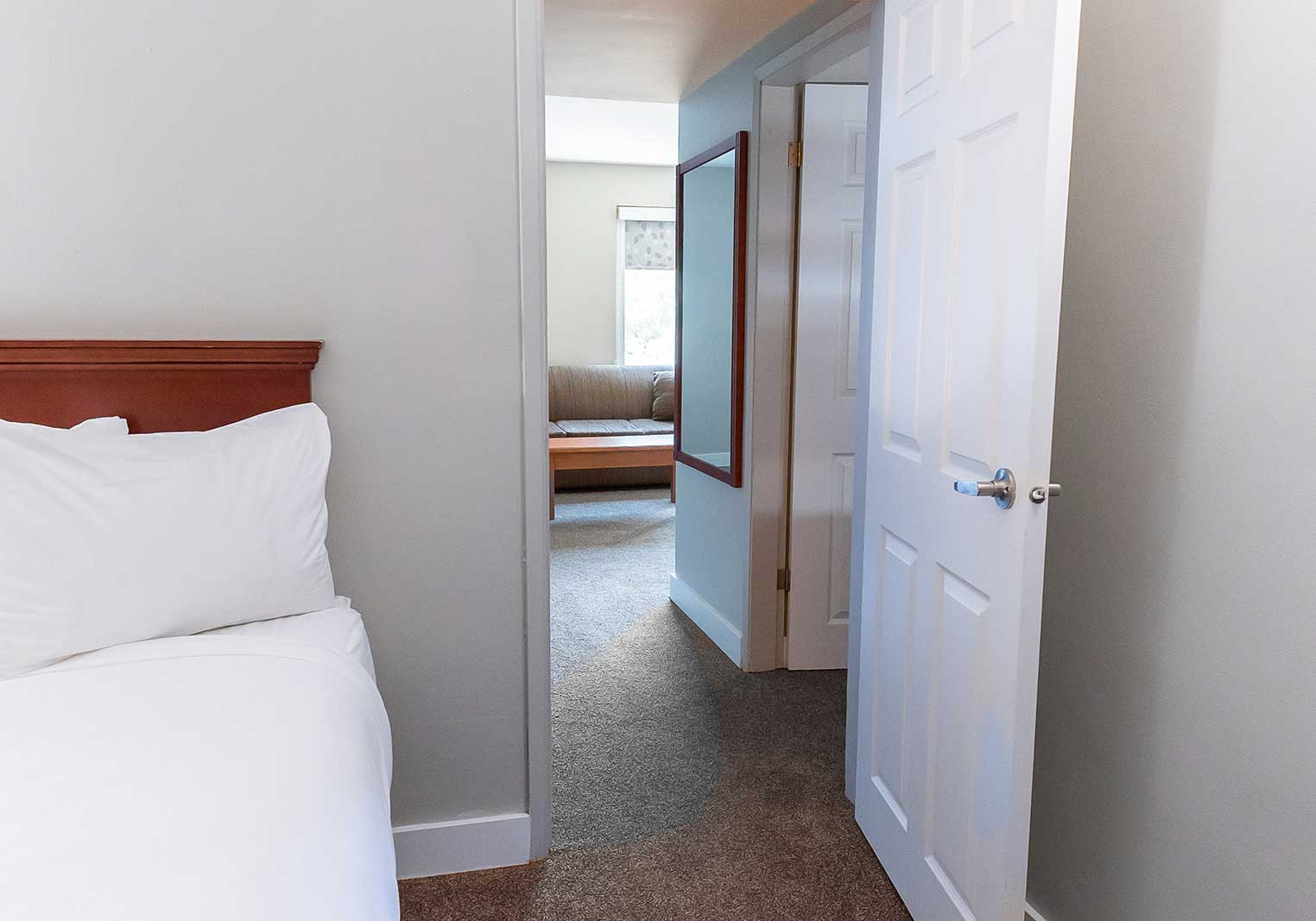 A view into the second room of the family suite at Scott's Inn.