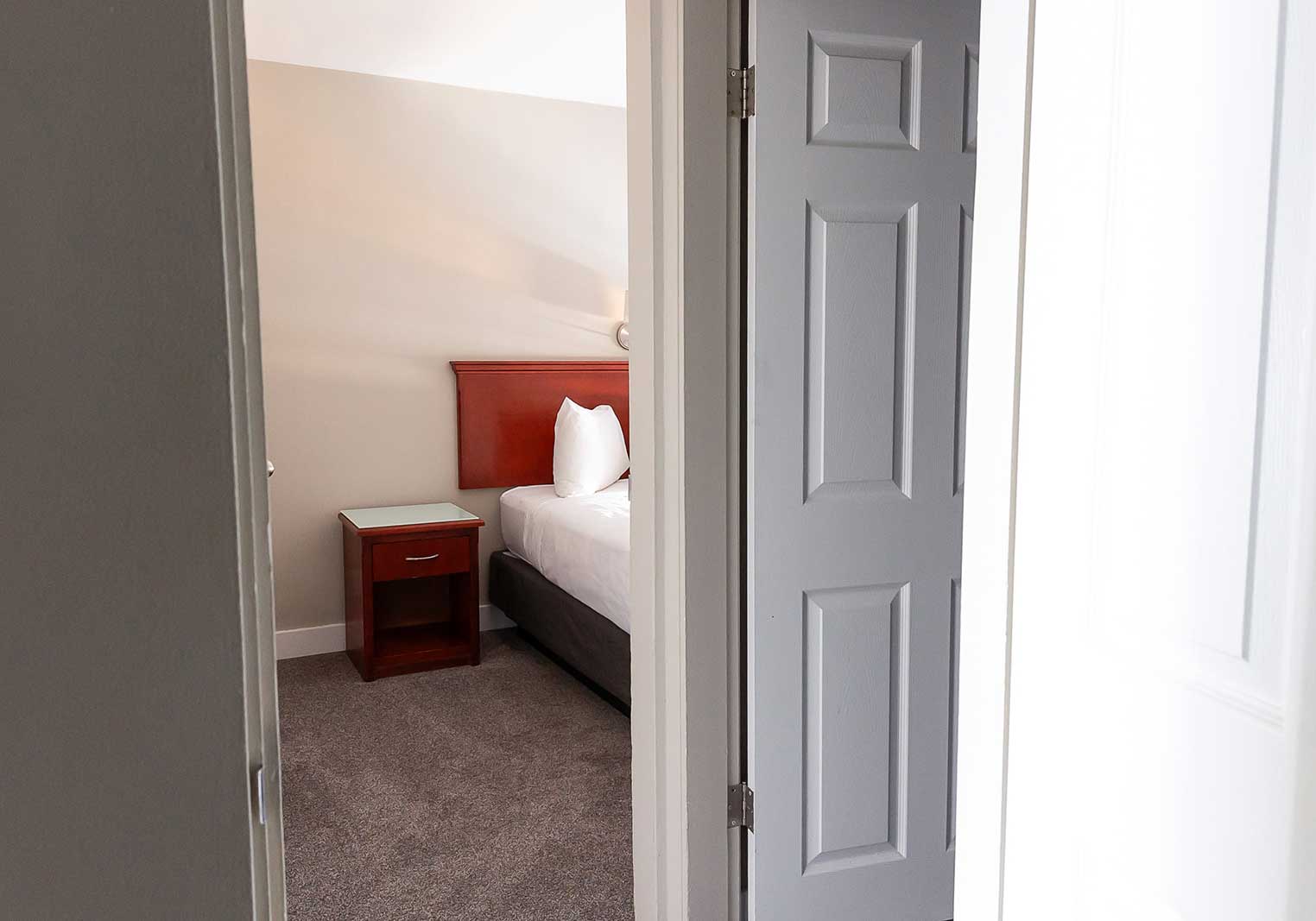 A view into the bedroom of the family suite at Scott's Inn.