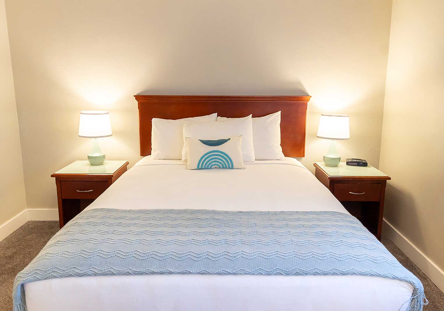The queen bed in a suite at Scott's Inn.